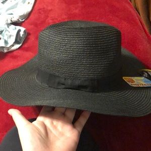 Black hat with round brim never used